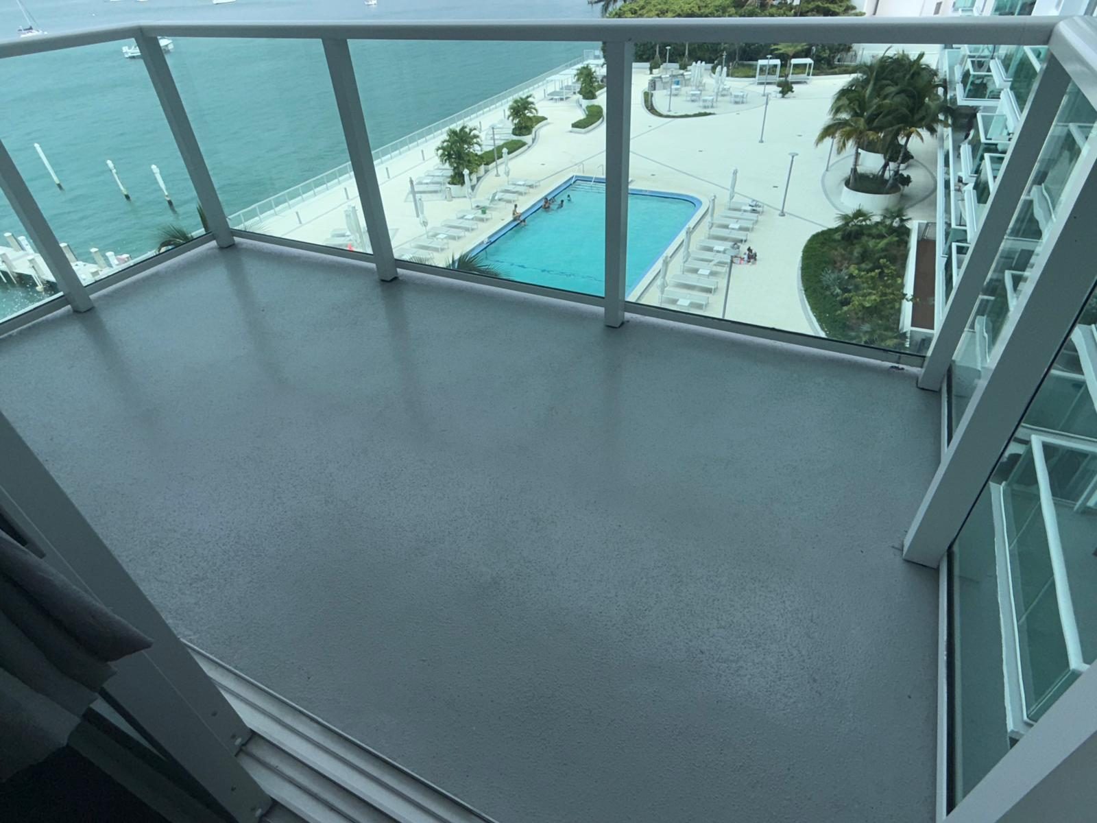 Bayfront balcony with pool view