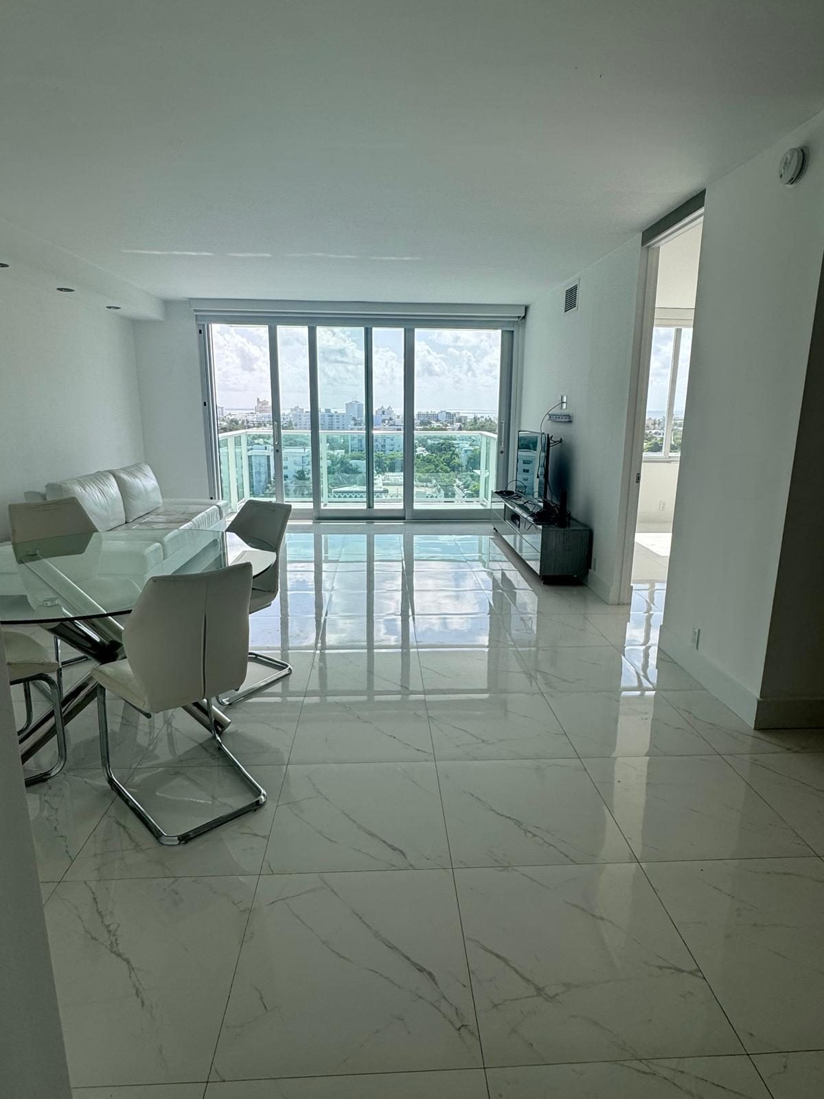 Bright living and dining, marble floors